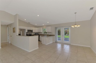 Welcome to this well-maintained 3-bedroom, 2-bath home with a on Duffys Golf Center in Florida - for sale on GolfHomes.com, golf home, golf lot