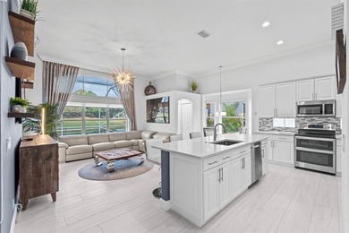 LAKEFRONT, GOLF COURSE, POOL HOME in one of Palm Beach County's on Winston Trails Golf Course in Florida - for sale on GolfHomes.com, golf home, golf lot