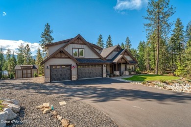 SPECTACULAR AND PRIVATE RETREAT SETTING AMONGST THE TREES IN on Hayden Lake Country Club in Idaho - for sale on GolfHomes.com, golf home, golf lot