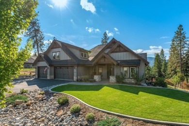 SPECTACULAR AND PRIVATE RETREAT SETTING AMONGST THE TREES IN on Hayden Lake Country Club in Idaho - for sale on GolfHomes.com, golf home, golf lot