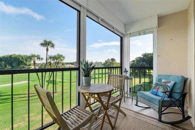 You'll fall in love with this move-in ready & beautifully on Hillsboro Pines Golf in Florida - for sale on GolfHomes.com, golf home, golf lot