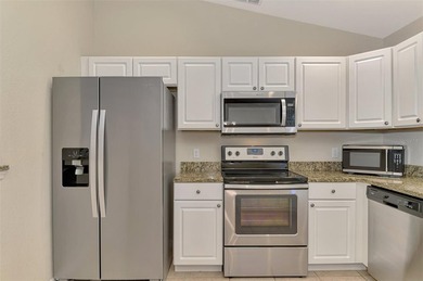 Welcome to this well-maintained 3-bedroom, 2-bath home with a on Duffys Golf Center in Florida - for sale on GolfHomes.com, golf home, golf lot