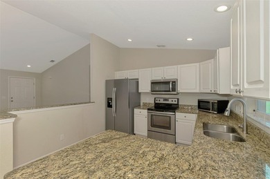 Welcome to this well-maintained 3-bedroom, 2-bath home with a on Duffys Golf Center in Florida - for sale on GolfHomes.com, golf home, golf lot