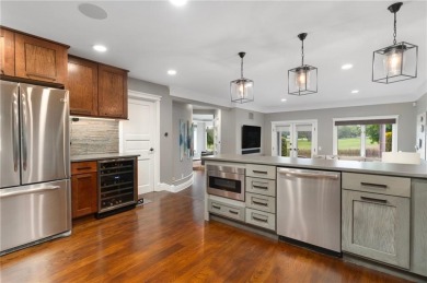 This is a rare opportunity to own a move-in-ready showpiece in on Quidnessett Country Club in Rhode Island - for sale on GolfHomes.com, golf home, golf lot