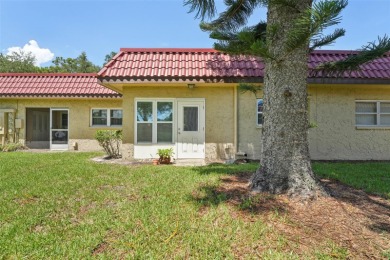 NOT in a floodzone! Welcome home to Pinewood Village, a premier on Clearwater Executive Golf Course in Florida - for sale on GolfHomes.com, golf home, golf lot