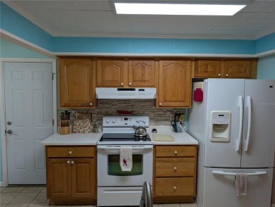 Under contract-accepting backup offers. Attention Golfers on Mainlands Golf Club in Florida - for sale on GolfHomes.com, golf home, golf lot