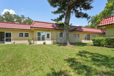 NOT in a floodzone! Welcome home to Pinewood Village, a premier on Clearwater Executive Golf Course in Florida - for sale on GolfHomes.com, golf home, golf lot