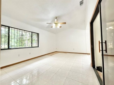 Nestled in the heart of Poinciana, FL, this charming on Poinciana Golf Club in Florida - for sale on GolfHomes.com, golf home, golf lot