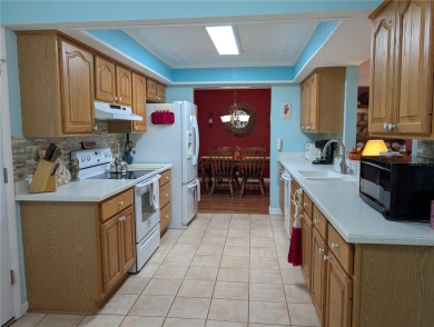 Under contract-accepting backup offers. Attention Golfers on Mainlands Golf Club in Florida - for sale on GolfHomes.com, golf home, golf lot