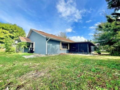 Nestled in the heart of Poinciana, FL, this charming on Poinciana Golf Club in Florida - for sale on GolfHomes.com, golf home, golf lot