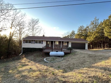 Don't miss this newly remodeled, spacious home! Updates include on The Course At Turkey Mountain in Arkansas - for sale on GolfHomes.com, golf home, golf lot