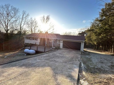 Don't miss this newly remodeled, spacious home! Updates include on The Course At Turkey Mountain in Arkansas - for sale on GolfHomes.com, golf home, golf lot