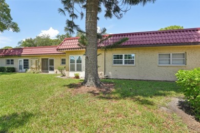 NOT in a floodzone! Welcome home to Pinewood Village, a premier on Clearwater Executive Golf Course in Florida - for sale on GolfHomes.com, golf home, golf lot