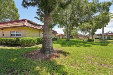 NOT in a floodzone! Welcome home to Pinewood Village, a premier on Clearwater Executive Golf Course in Florida - for sale on GolfHomes.com, golf home, golf lot