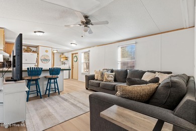 Welcome to the ultimate turnkey escape! Just a few miles from on Brick Landing Plantation Yacht and Golf Club in North Carolina - for sale on GolfHomes.com, golf home, golf lot