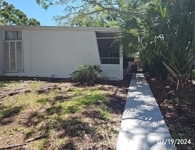 Vintage modern duplex with mirrored 2 bedrooms and 2 baths on on The Renaisssance Vinoy Golf Club in Florida - for sale on GolfHomes.com, golf home, golf lot