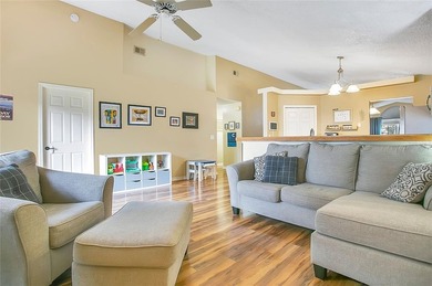 Immaculate home in highly desirable Waterford Lakes, nestled on on Eastwood Golf Club in Florida - for sale on GolfHomes.com, golf home, golf lot