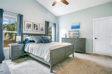 Immaculate home in highly desirable Waterford Lakes, nestled on on Eastwood Golf Club in Florida - for sale on GolfHomes.com, golf home, golf lot