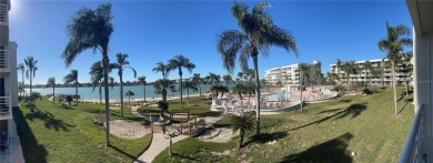 Under contract-accepting backup offers. Imagine waking up to on Isla Del Sol Yacht and Country Club in Florida - for sale on GolfHomes.com, golf home, golf lot