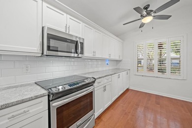 Beautifully remodeled single-story home offering 2 bedrooms, 2 on PGA National Golf Club in Florida - for sale on GolfHomes.com, golf home, golf lot