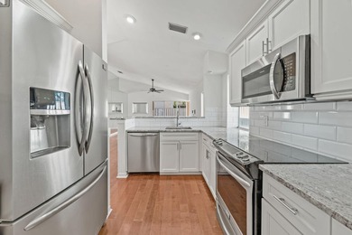 Beautifully remodeled single-story home offering 2 bedrooms, 2 on PGA National Golf Club in Florida - for sale on GolfHomes.com, golf home, golf lot
