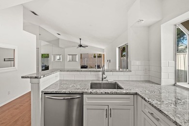Beautifully remodeled single-story home offering 2 bedrooms, 2 on PGA National Golf Club in Florida - for sale on GolfHomes.com, golf home, golf lot