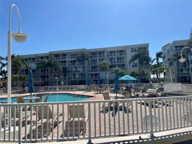 Under contract-accepting backup offers. Imagine waking up to on Isla Del Sol Yacht and Country Club in Florida - for sale on GolfHomes.com, golf home, golf lot