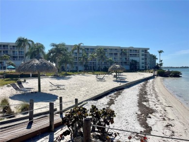 Under contract-accepting backup offers. Imagine waking up to on Isla Del Sol Yacht and Country Club in Florida - for sale on GolfHomes.com, golf home, golf lot