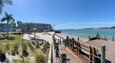 Under contract-accepting backup offers. Imagine waking up to on Isla Del Sol Yacht and Country Club in Florida - for sale on GolfHomes.com, golf home, golf lot