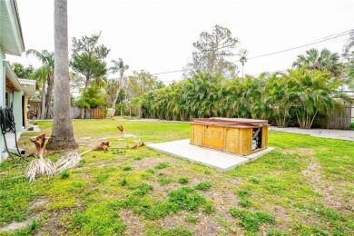 This home lies amongst water front estates on the beautiful on The Dunedin Country Club in Florida - for sale on GolfHomes.com, golf home, golf lot