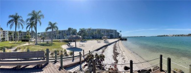 Under contract-accepting backup offers. Imagine waking up to on Isla Del Sol Yacht and Country Club in Florida - for sale on GolfHomes.com, golf home, golf lot