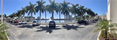 Under contract-accepting backup offers. Imagine waking up to on Isla Del Sol Yacht and Country Club in Florida - for sale on GolfHomes.com, golf home, golf lot