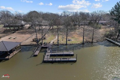 Timeless waterfront beauty in Emerald Bay on Lake Palestine! on Emerald Bay Club in Texas - for sale on GolfHomes.com, golf home, golf lot