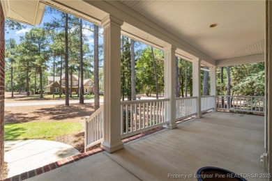 GORGEOUS, GOLF FRONT LIVING IN PINEWILD! Perfectly positioned on on Pinewild Country Club of Pinehurst in North Carolina - for sale on GolfHomes.com, golf home, golf lot
