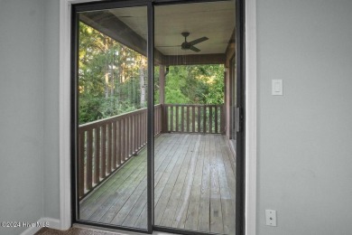 Top-floor condo with stunning views of the 8th hole at Highland on Hyland Golf Club in North Carolina - for sale on GolfHomes.com, golf home, golf lot