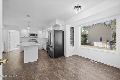 Situated on a quiet culdesac, this 3 bedroom, 2.5 bath home on Rock Creek Country Club in North Carolina - for sale on GolfHomes.com, golf home, golf lot