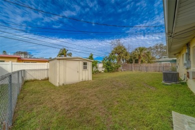 Nestled in the heart of Dunedin, this property boasts an on The Dunedin Country Club in Florida - for sale on GolfHomes.com, golf home, golf lot