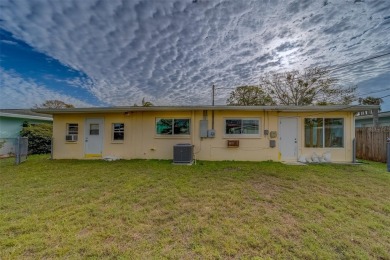 Nestled in the heart of Dunedin, this property boasts an on The Dunedin Country Club in Florida - for sale on GolfHomes.com, golf home, golf lot