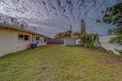 Nestled in the heart of Dunedin, this property boasts an on The Dunedin Country Club in Florida - for sale on GolfHomes.com, golf home, golf lot