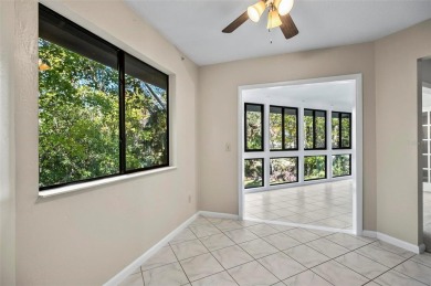 Nestled in the Spanish moss draped live oaks, this lovely 2 on Palm Harbor Golf Club in Florida - for sale on GolfHomes.com, golf home, golf lot