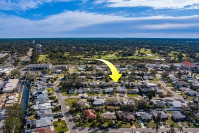 Nestled in the heart of Dunedin, this property boasts an on The Dunedin Country Club in Florida - for sale on GolfHomes.com, golf home, golf lot