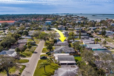 Nestled in the heart of Dunedin, this property boasts an on The Dunedin Country Club in Florida - for sale on GolfHomes.com, golf home, golf lot