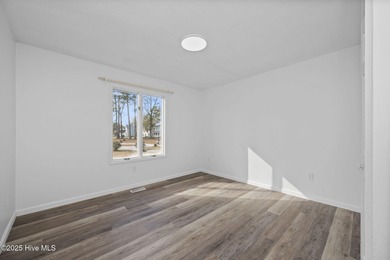 Situated on a quiet culdesac, this 3 bedroom, 2.5 bath home on Rock Creek Country Club in North Carolina - for sale on GolfHomes.com, golf home, golf lot