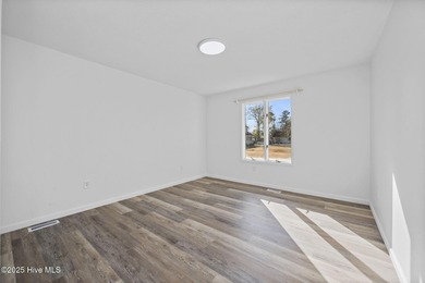 Situated on a quiet culdesac, this 3 bedroom, 2.5 bath home on Rock Creek Country Club in North Carolina - for sale on GolfHomes.com, golf home, golf lot