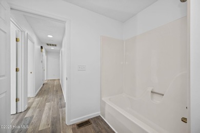 Situated on a quiet culdesac, this 3 bedroom, 2.5 bath home on Rock Creek Country Club in North Carolina - for sale on GolfHomes.com, golf home, golf lot