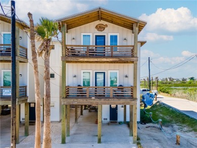 This stunning turnkey beach house is your ideal sunset retreat! on Palmilla Beach Golf Club in Texas - for sale on GolfHomes.com, golf home, golf lot