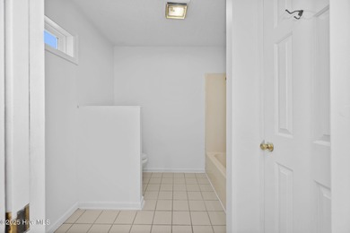 Situated on a quiet culdesac, this 3 bedroom, 2.5 bath home on Rock Creek Country Club in North Carolina - for sale on GolfHomes.com, golf home, golf lot