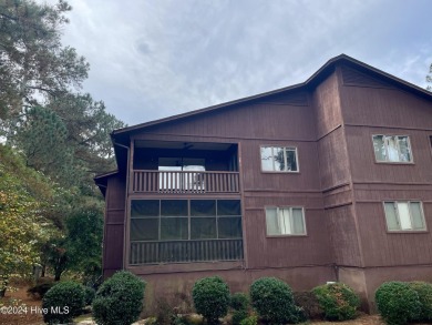 Top-floor condo with stunning views of the 8th hole at Highland on Hyland Golf Club in North Carolina - for sale on GolfHomes.com, golf home, golf lot