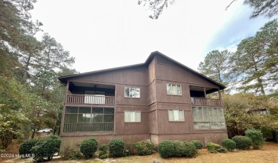 Top-floor condo with stunning views of the 8th hole at Highland on Hyland Golf Club in North Carolina - for sale on GolfHomes.com, golf home, golf lot