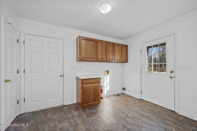 Situated on a quiet culdesac, this 3 bedroom, 2.5 bath home on Rock Creek Country Club in North Carolina - for sale on GolfHomes.com, golf home, golf lot